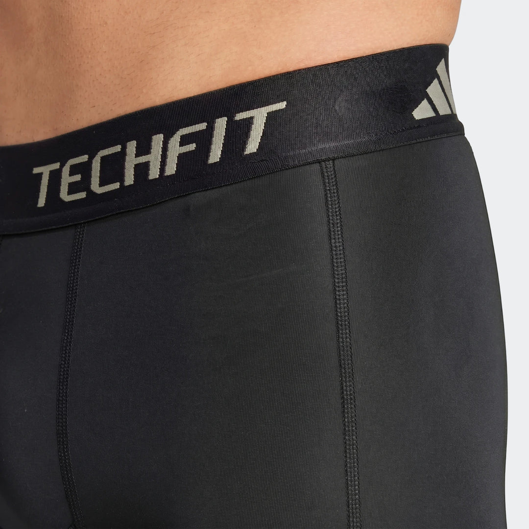 Black Football Base Layer Short Tights with TECHFIT branding, showing fit and fabric detail on a model.