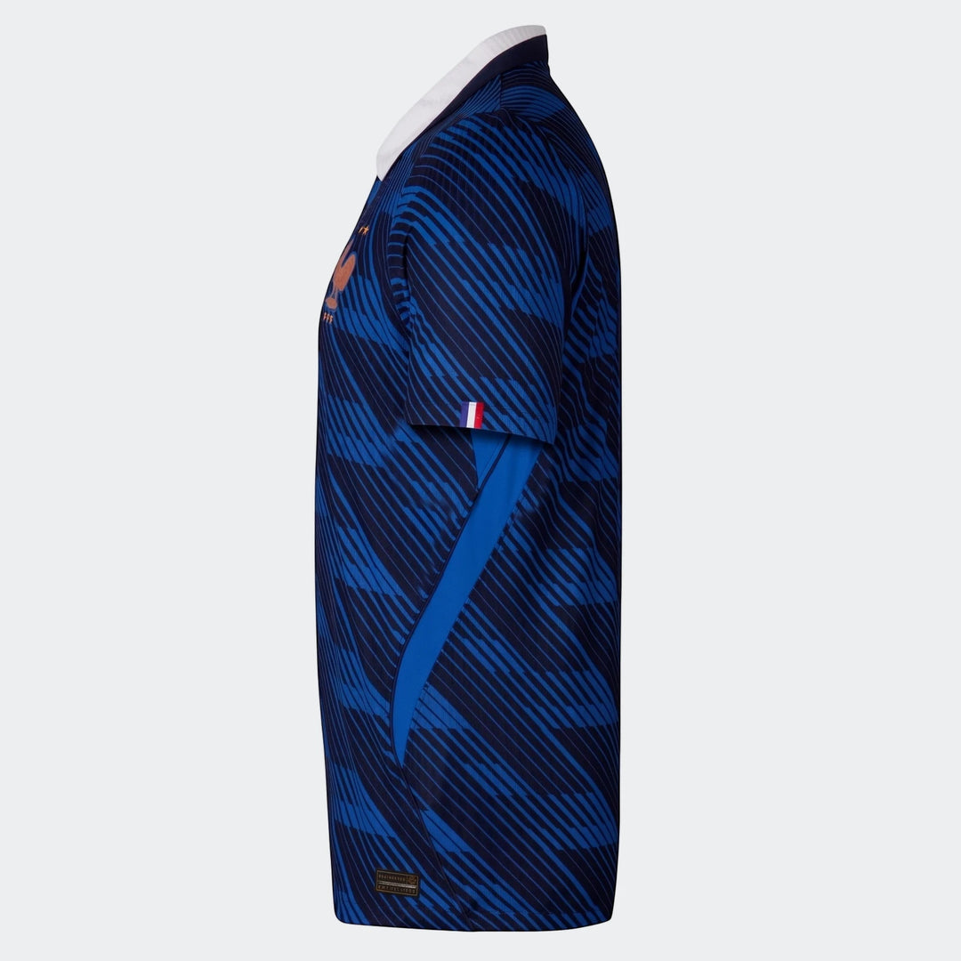 France National Team 2026 Match Home Blue Men's Nike Aero-Fit Soccer Jersey, side view, with striped pattern and team crest.
