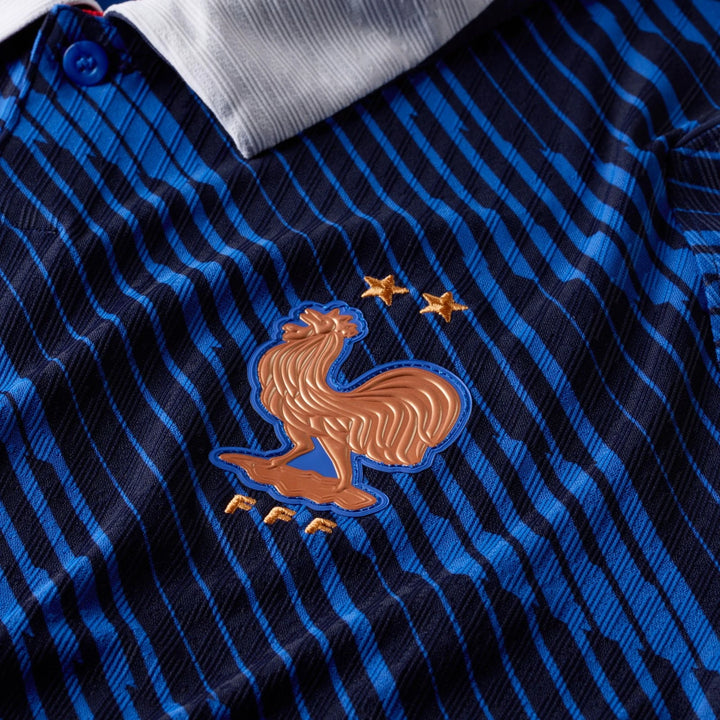 Close-up of France National Team 2026 Match Home Blue Nike Aero-Fit Soccer Jersey, showing striped fabric and embroidered