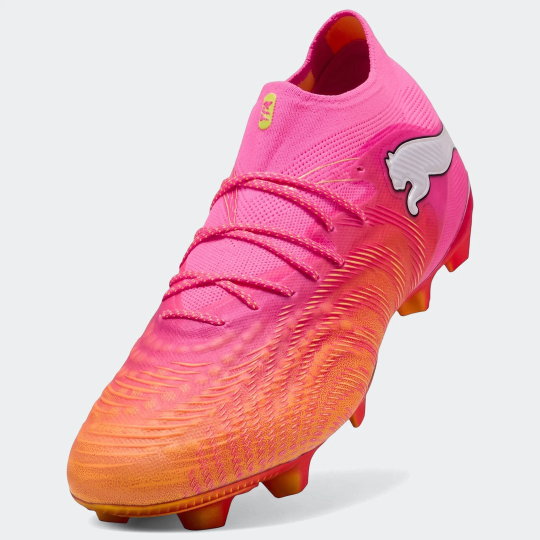 Pink and orange Puma Future 9 Ultimate FG unisex football boots, angled view, showing textured upper and studs.