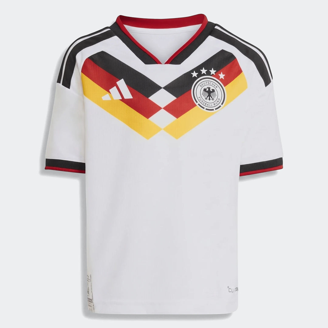 Germany 25/26 Home Mini Kit white soccer jersey, front view, featuring black, red, and gold chest design and team crest.