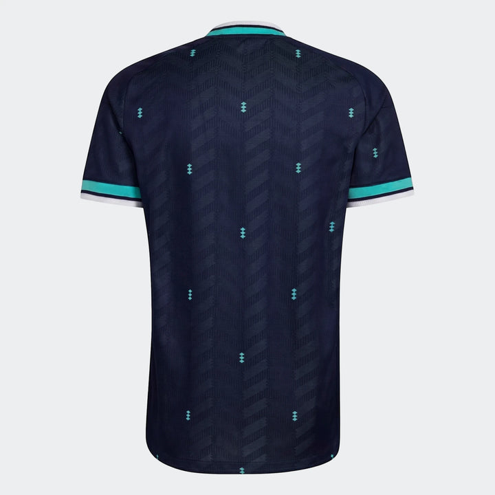 Back view of the Germany 26 Away Authentic Jersey in navy blue with a subtle chevron pattern and teal collar and sleeve