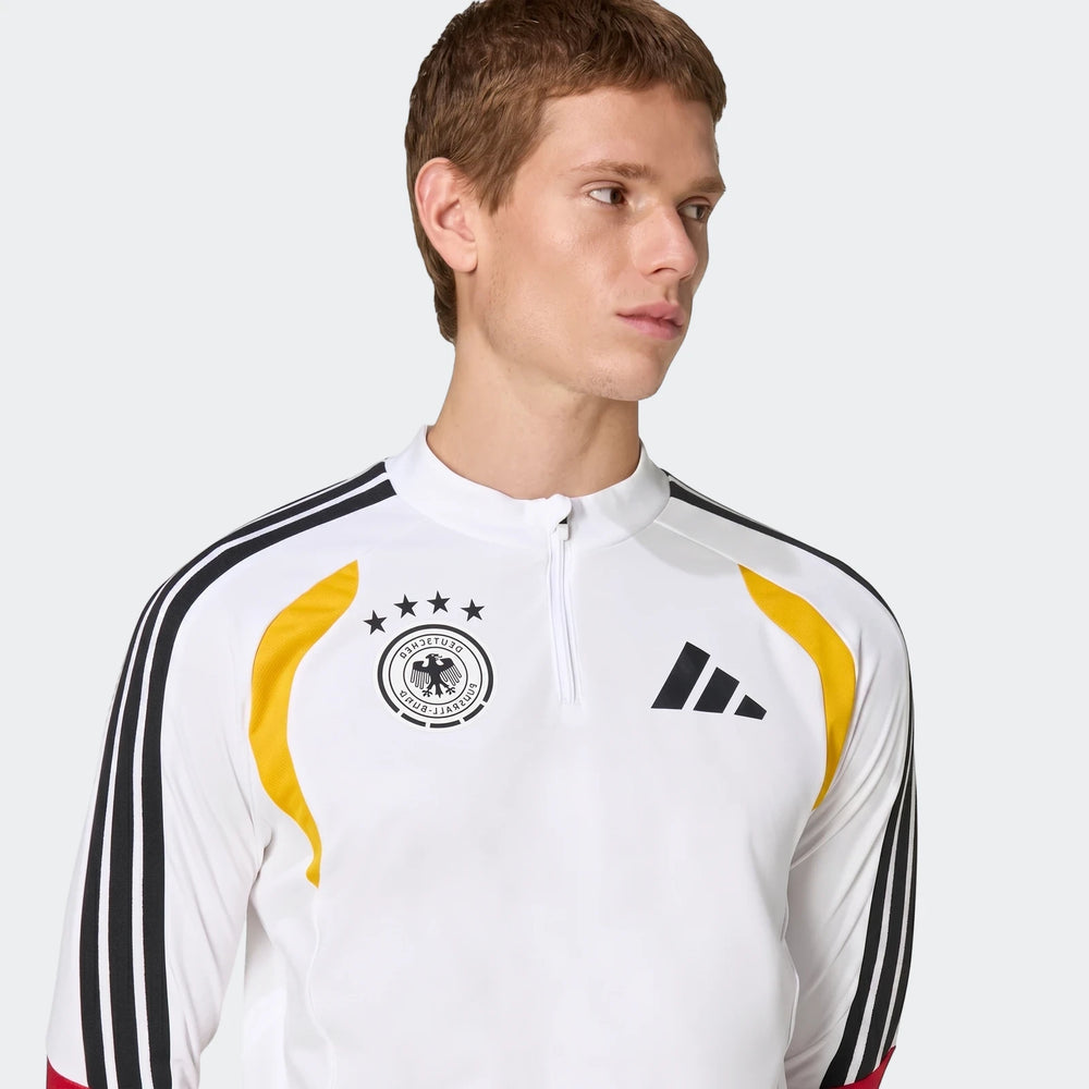 Men's white long-sleeve Adidas Germany 26 Tiro Training Top with black stripes and team crest, modeled from the chest up.