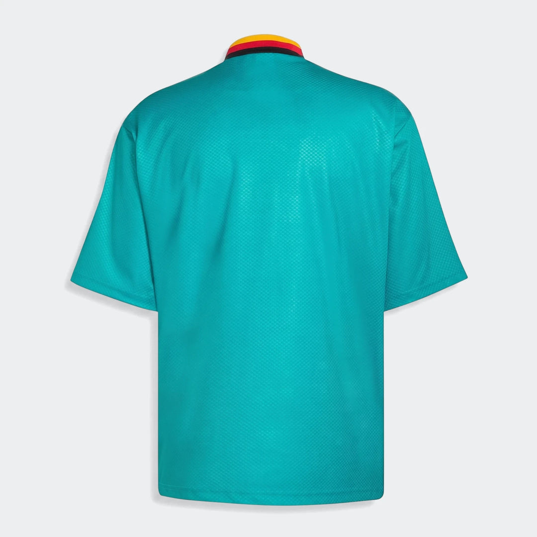 Back view of the Germany Away Jersey 1994 in teal, featuring short sleeves and a distinctive red, yellow, and black striped