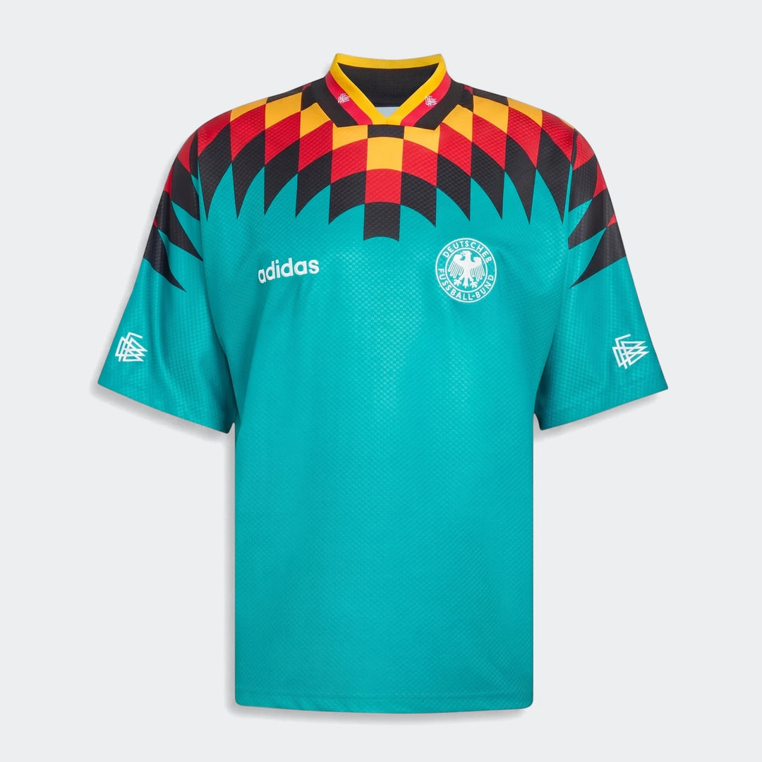 Germany Away Jersey 1994, teal with black, red, and yellow checkerboard shoulders, front view.