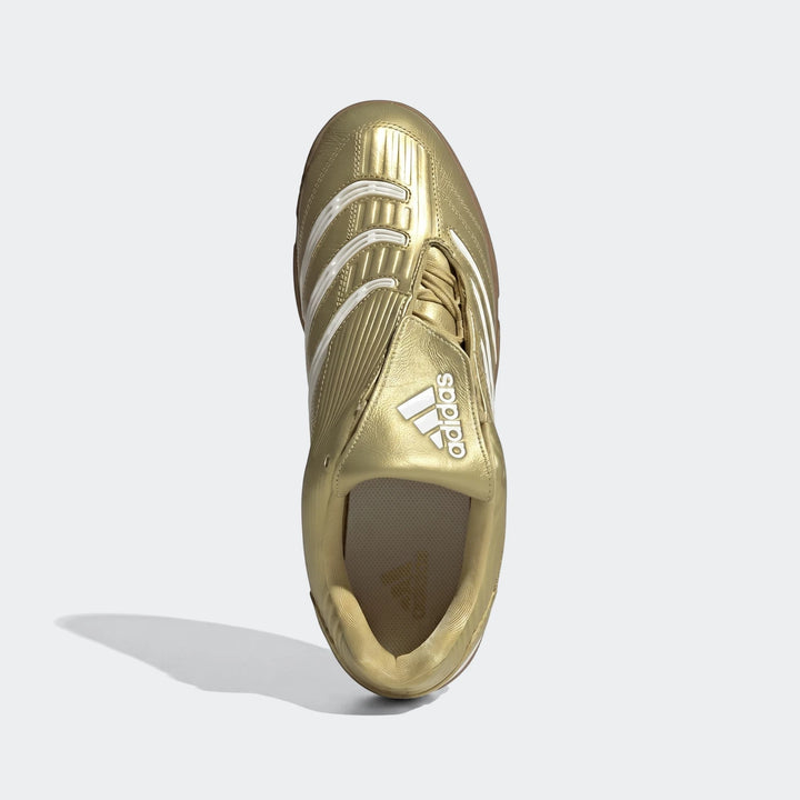 Gold Adidas Predator Sala Indoor Football Boot, top view, showcasing its metallic finish and iconic three stripes.