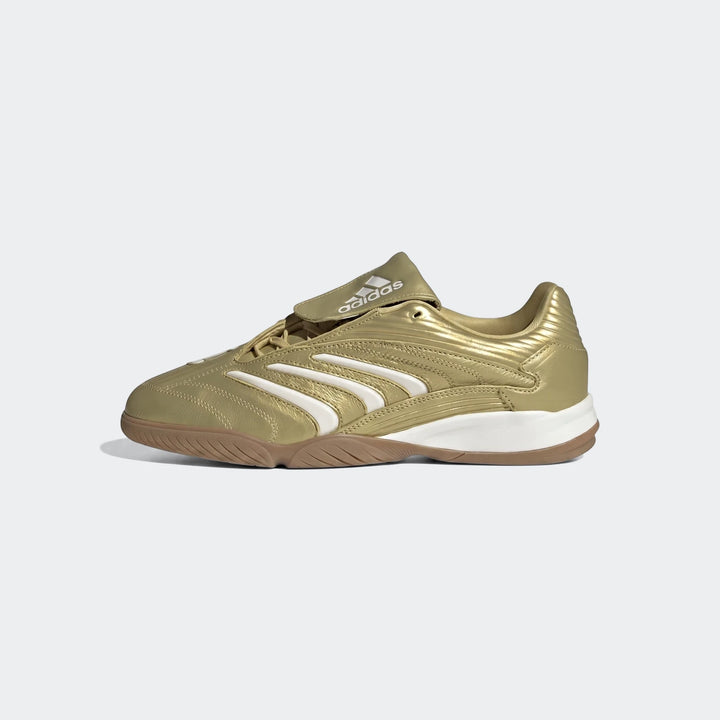 Gold Adidas Predator Sala Indoor Football Boots with white stripes and a brown gum sole, viewed from the side on a plain