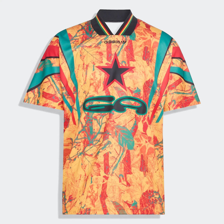 Graphic Football Jersey with a vibrant yellow, orange, and red abstract leaf pattern, featuring a black collar, Adidas logo,