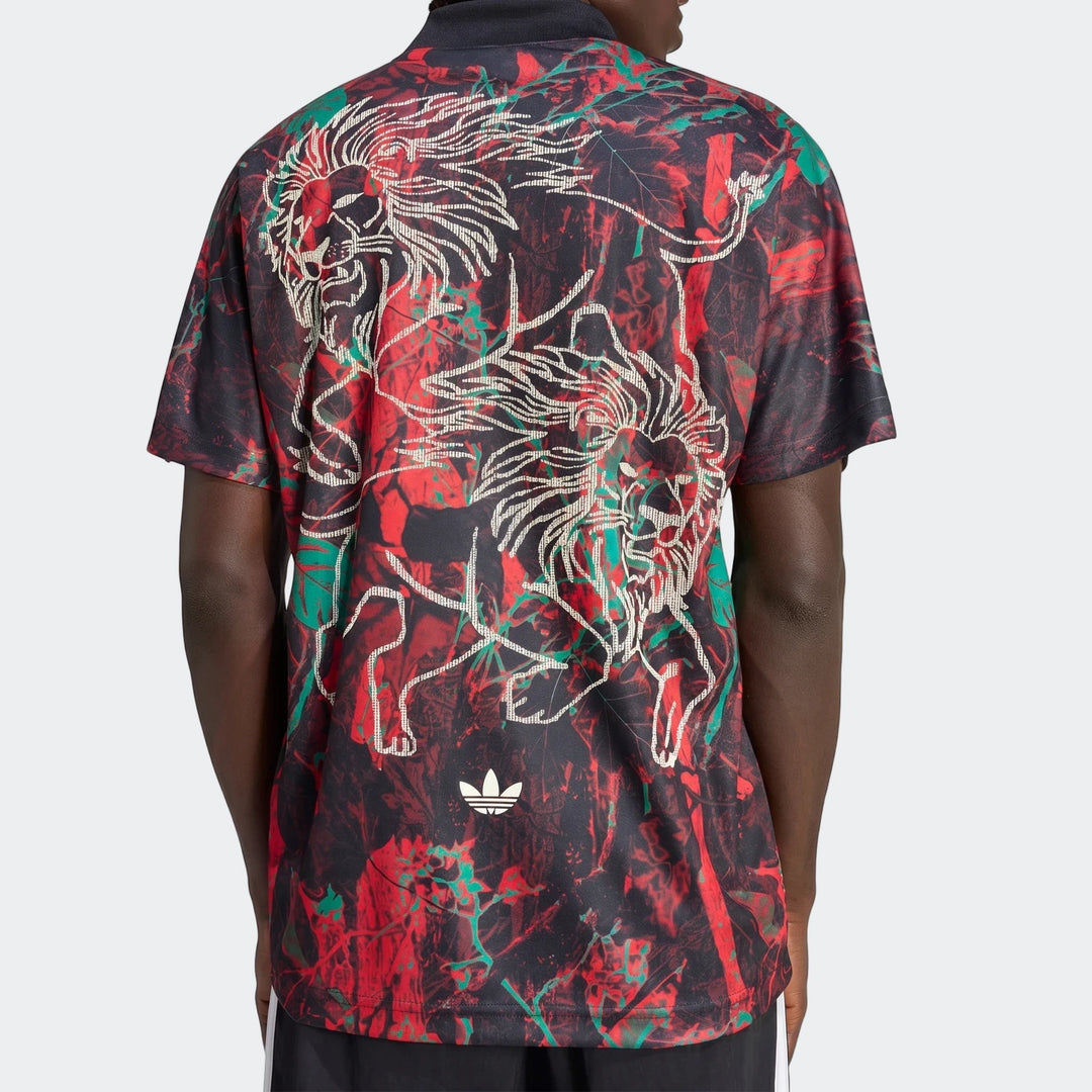 Graphic Football Jersey in black with red and green abstract print, back view showing large lion graphic