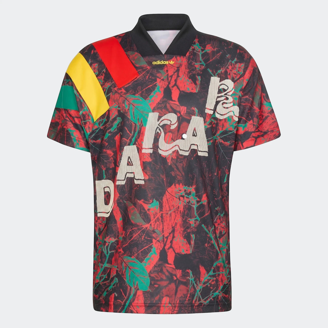 Red and black graphic football jersey with green and yellow accents, featuring 'JAMAICA' text and an Adidas logo, displayed