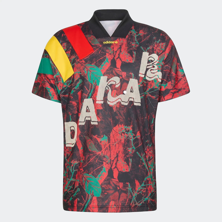 Red and black graphic football jersey with green and yellow accents, featuring 'JAMAICA' text and an Adidas logo, displayed
