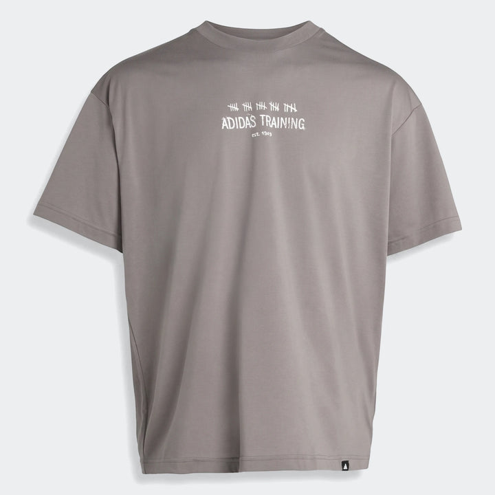Grey Adidas Primelift Graphic T-Shirt with white logo print on the front, short sleeves, and a crew neck.