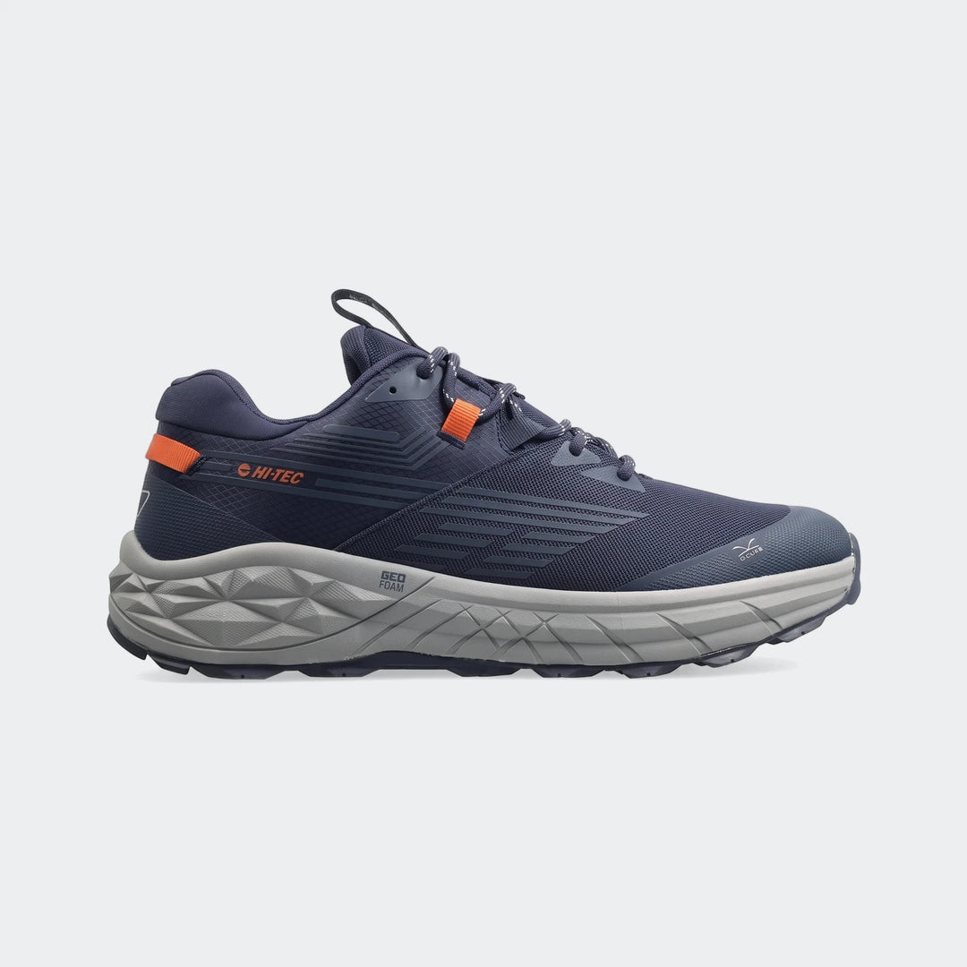 Dark blue Hi-Tec Fuse Trail Low II sneakers for men, featuring orange accents and a textured grey sole, shown from a side