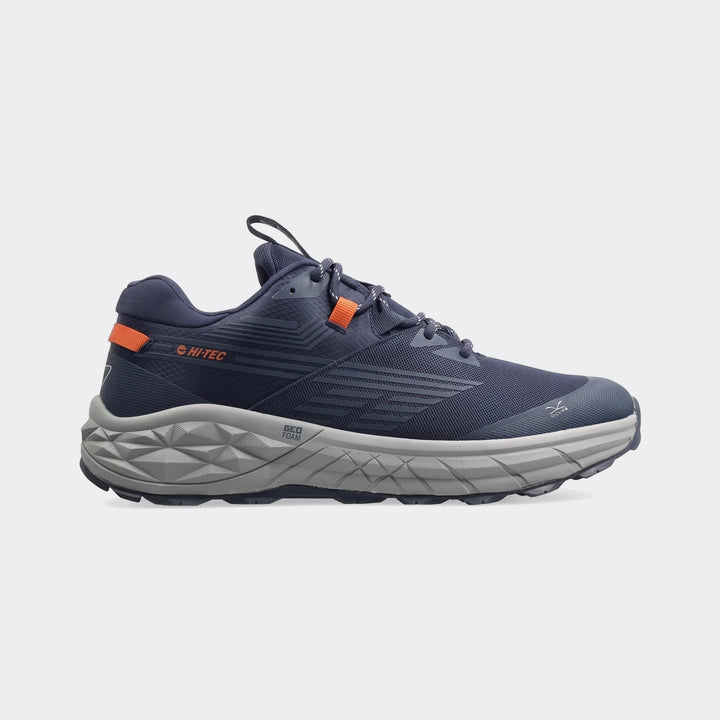 Dark blue Hi-Tec Fuse Trail Low II sneakers for men, featuring orange accents and a textured grey sole, shown from a side