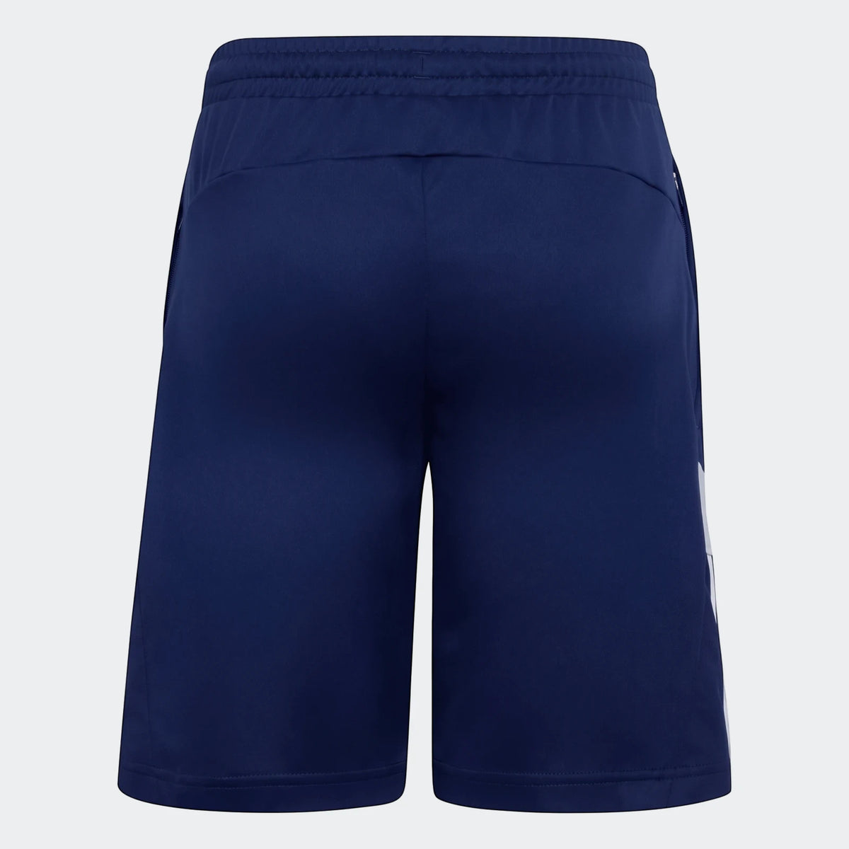 Back view of navy blue House Of Tiro Shorts featuring an elastic waistband, zippered pockets, and a white vertical stripe.