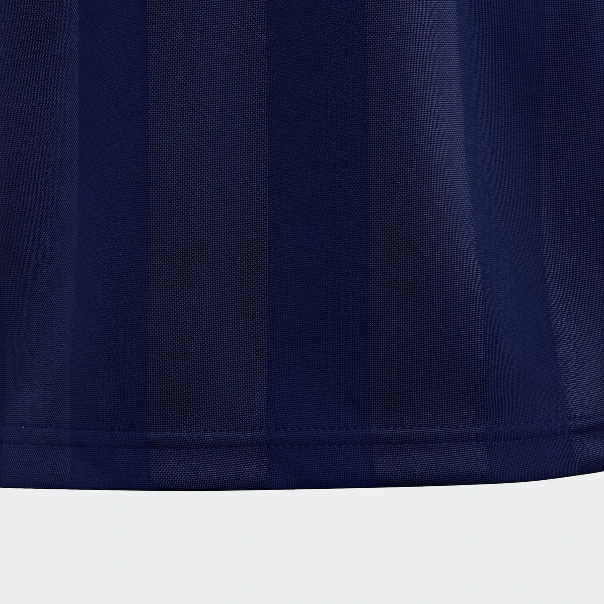 Close-up of a navy blue striped House Of Tiro Unisex T-Shirt, showcasing the fabric texture and stitched hem.