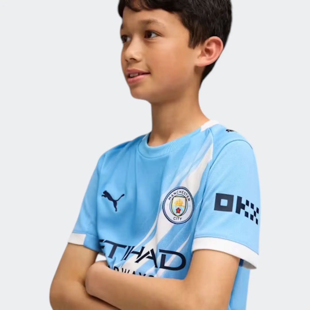 Mcfc Y Hm Jsy 25/26 Blue Jersey