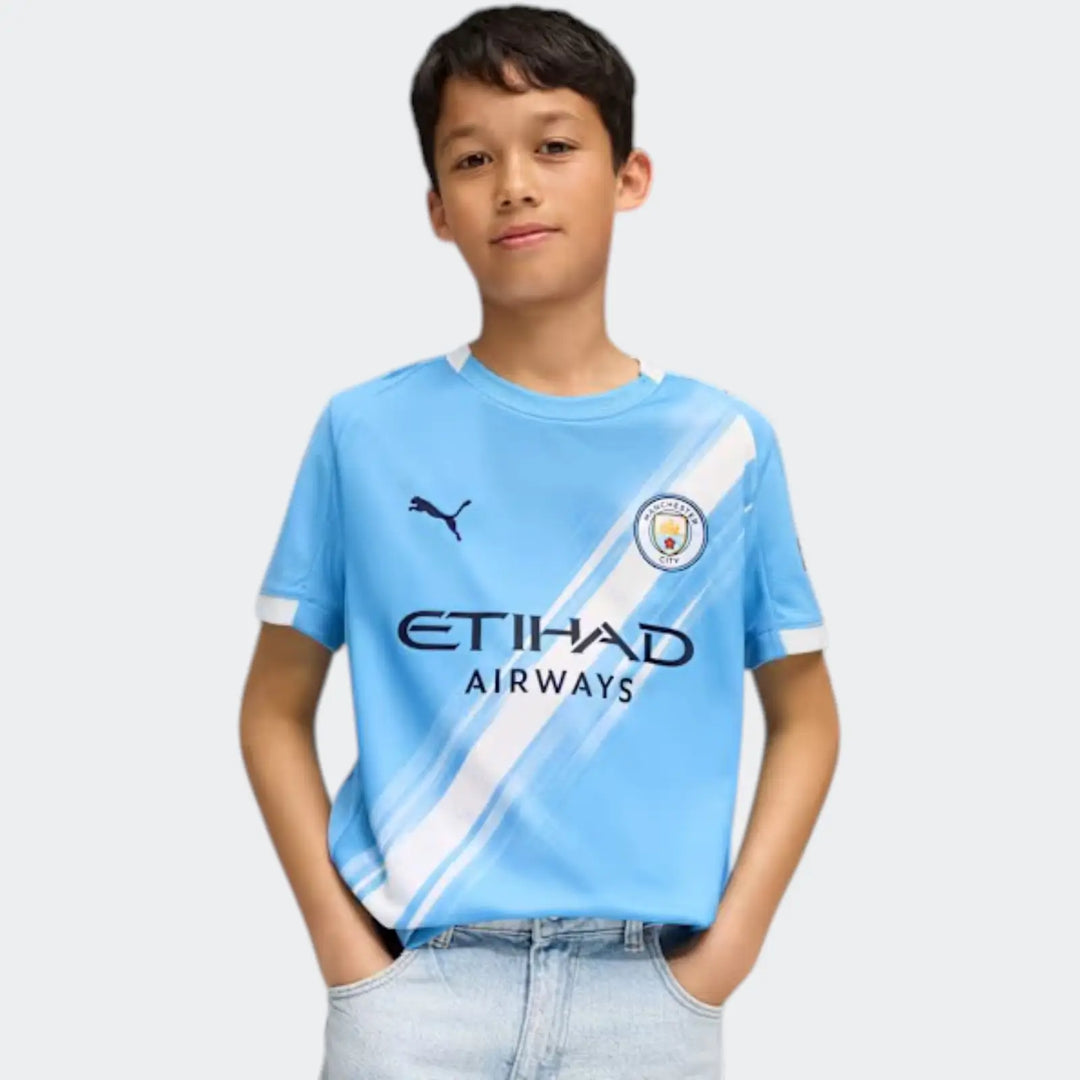 Mcfc Y Hm Jsy 25/26 Blue Jersey