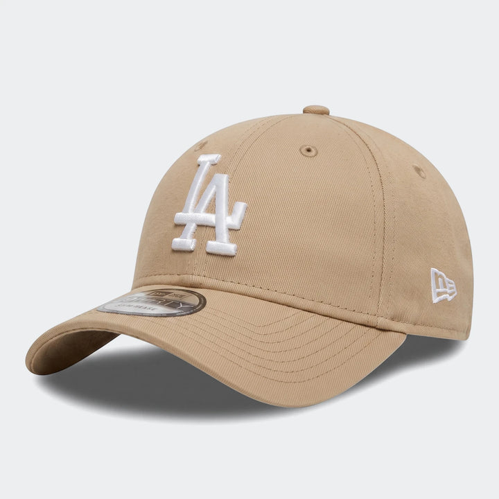 Infant League beige baseball cap with white LA logo and New Era branding, shown from a side angle.