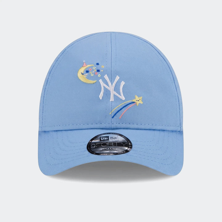 Light blue Infant League baseball cap featuring an embroidered New York Yankees logo, a moon, stars, and a rainbow. Front