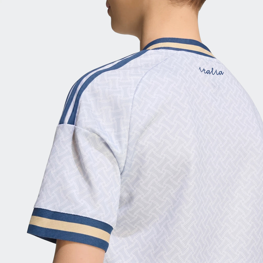 Italy 25/26 Away Jersey Youth, light blue and white patterned, shown from the back with blue shoulder stripes and 'Italia'