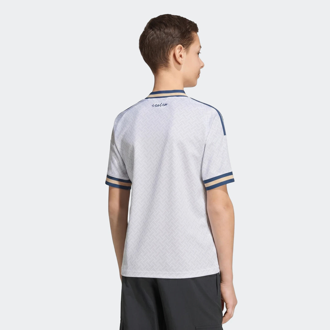 Italy 25/26 Away Jersey Youth in white/light gray with a geometric pattern, shown from the back on a young person.