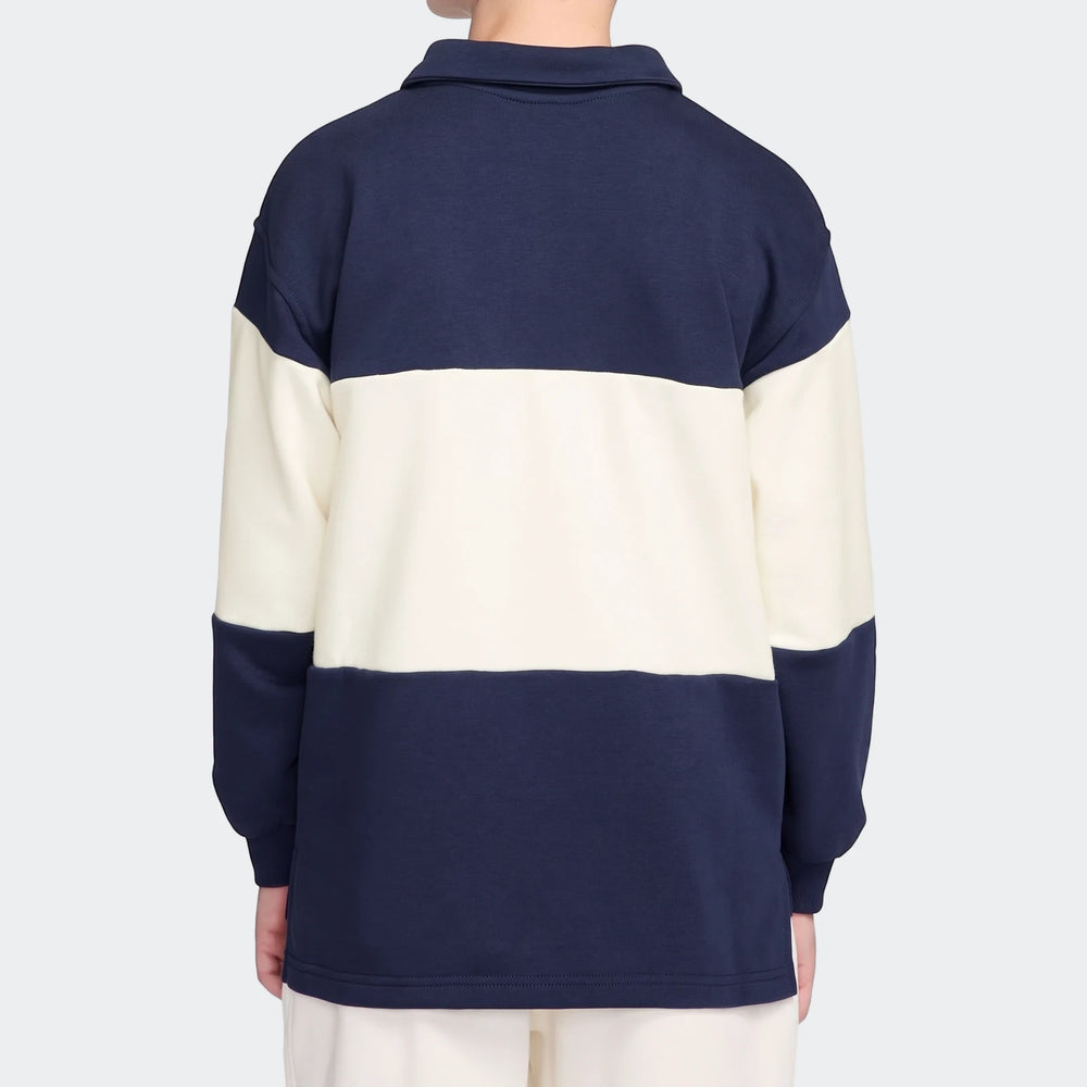 Back view of a person wearing a navy and off-white striped K Nsw Club Rugby long-sleeve shirt.