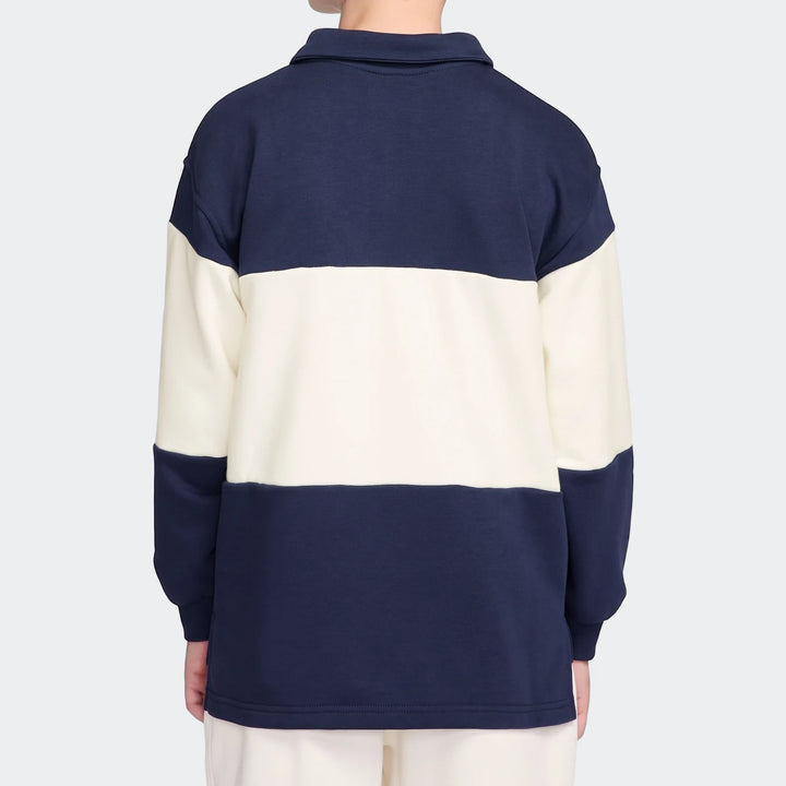 Back view of a person wearing a navy and off-white striped K Nsw Club Rugby long-sleeve shirt.