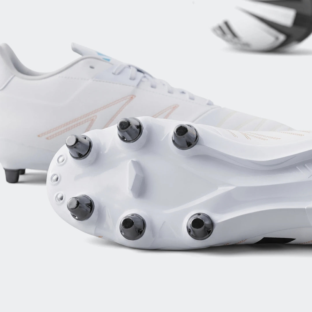 Kakari Elite Sg Rugby Boots in white, close-up showing studded outsole with metal screw-in soft ground studs