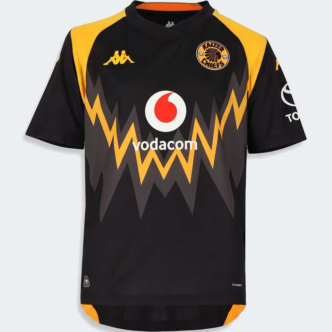 Kappa Kaizer Chiefs Kombat 2026/27 Away Jersey in black with yellow shoulders, chevron pattern, and sponsor logos.