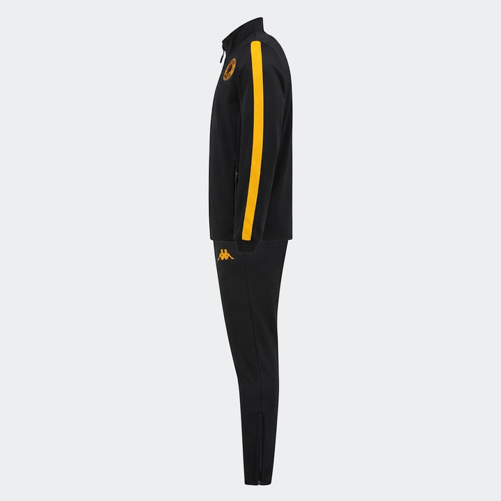Kappa Kaizer Chiefs Salcito 2 Am tracksuit in black and yellow, shown in a side profile. This full athletic set features
