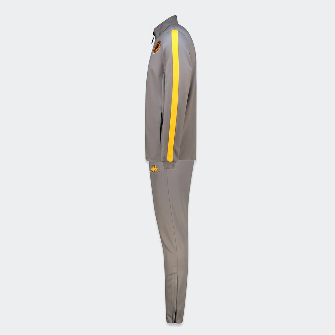 Grey and yellow Kappa Kaizer Chiefs Salcito 2 Am tracksuit, shown in a side profile view, with branding details.