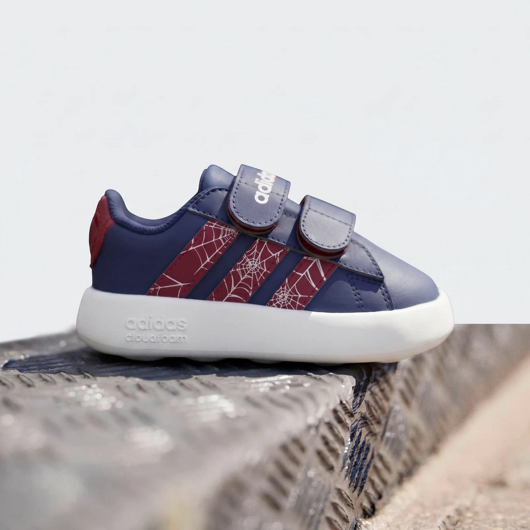 Kid's Adidas Grand Court Spider-Man Cloudfoam shoes in navy blue with red accents and a white spider-web pattern, featuring