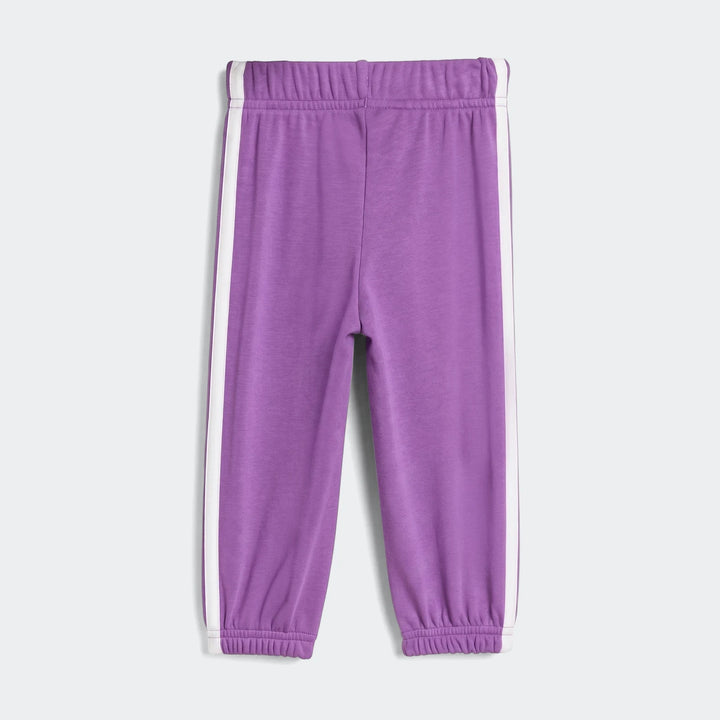 Kids' Essentials joggers in vibrant purple with white side stripes, showcased in a flat lay view.
