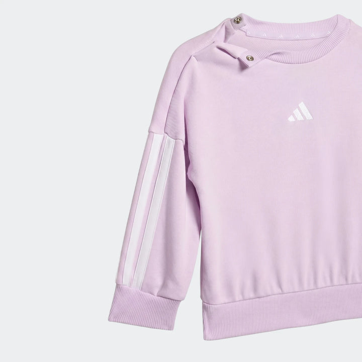 Kids' lavender long-sleeve Adidas sweatshirt from Essentials Joggers Set, featuring white stripes and logo.