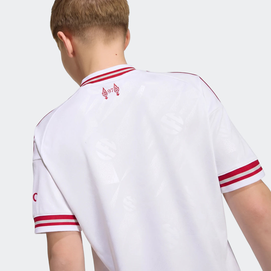 Kids Liverpool FC 26/27 away jersey in white with red trim, shown from the back on a model.
