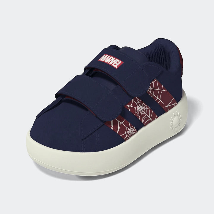 Kids' navy blue Adidas Grand Court Spider-Man Cloudfoam shoes with red stripes and spiderweb design, shown at an angle.
