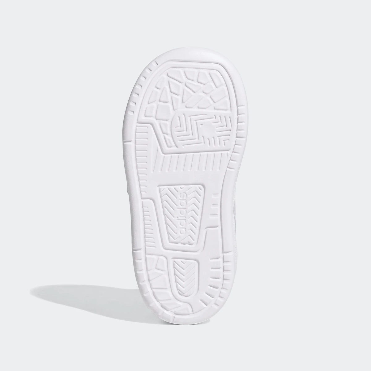Kids' white Adidas Break Start shoe, bottom view showing the textured sole pattern and brand logo.