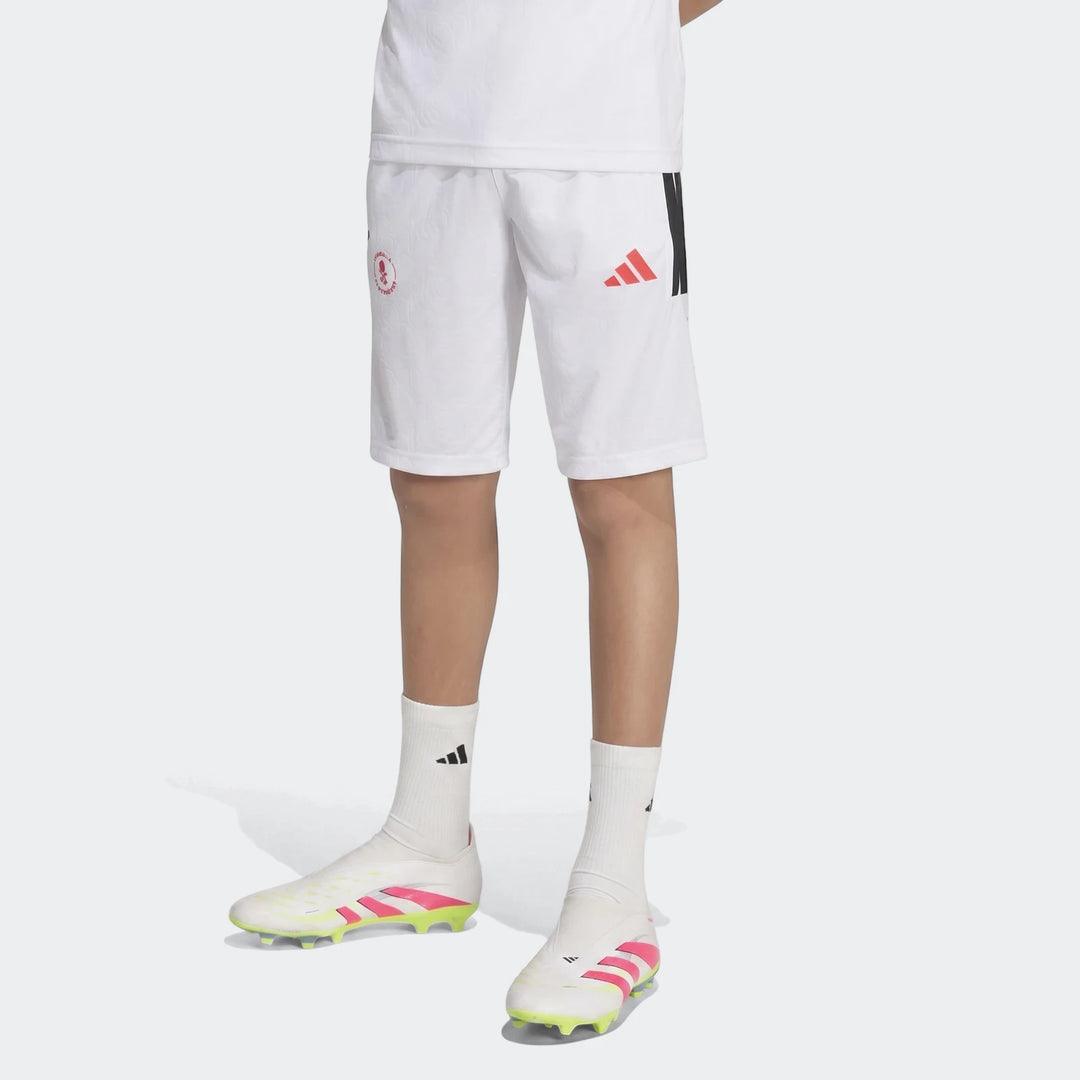 Youth Lamine Yamal Hot Shorts in white, styled with white socks and white, pink, and lime green football cleats.