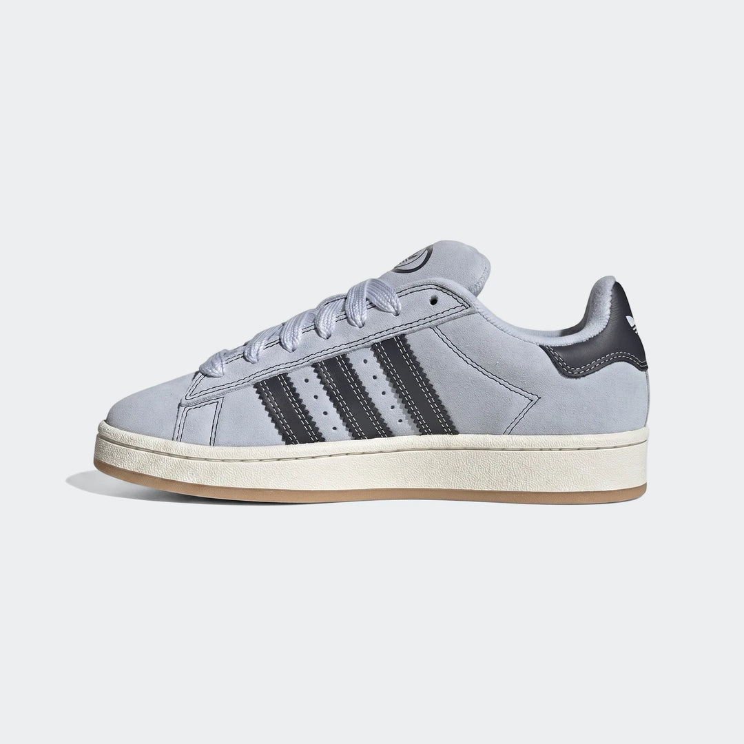 Light blue-grey Adidas Campus 00s suede sneakers, featuring dark stripes and a gum sole, side view.