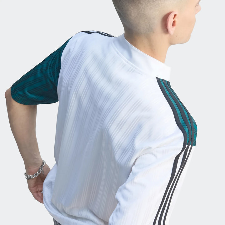 Liverpool Fc 1995 Away Jersey in white and teal, featuring a model's upper back and shoulder wearing the long-sleeved shirt.