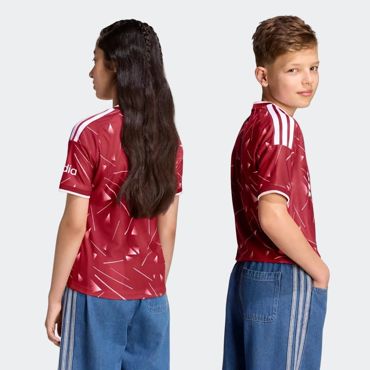 Liverpool FC 26/27 Authentic Home Jersey Youth in red with white shoulder stripes and geometric print, back view