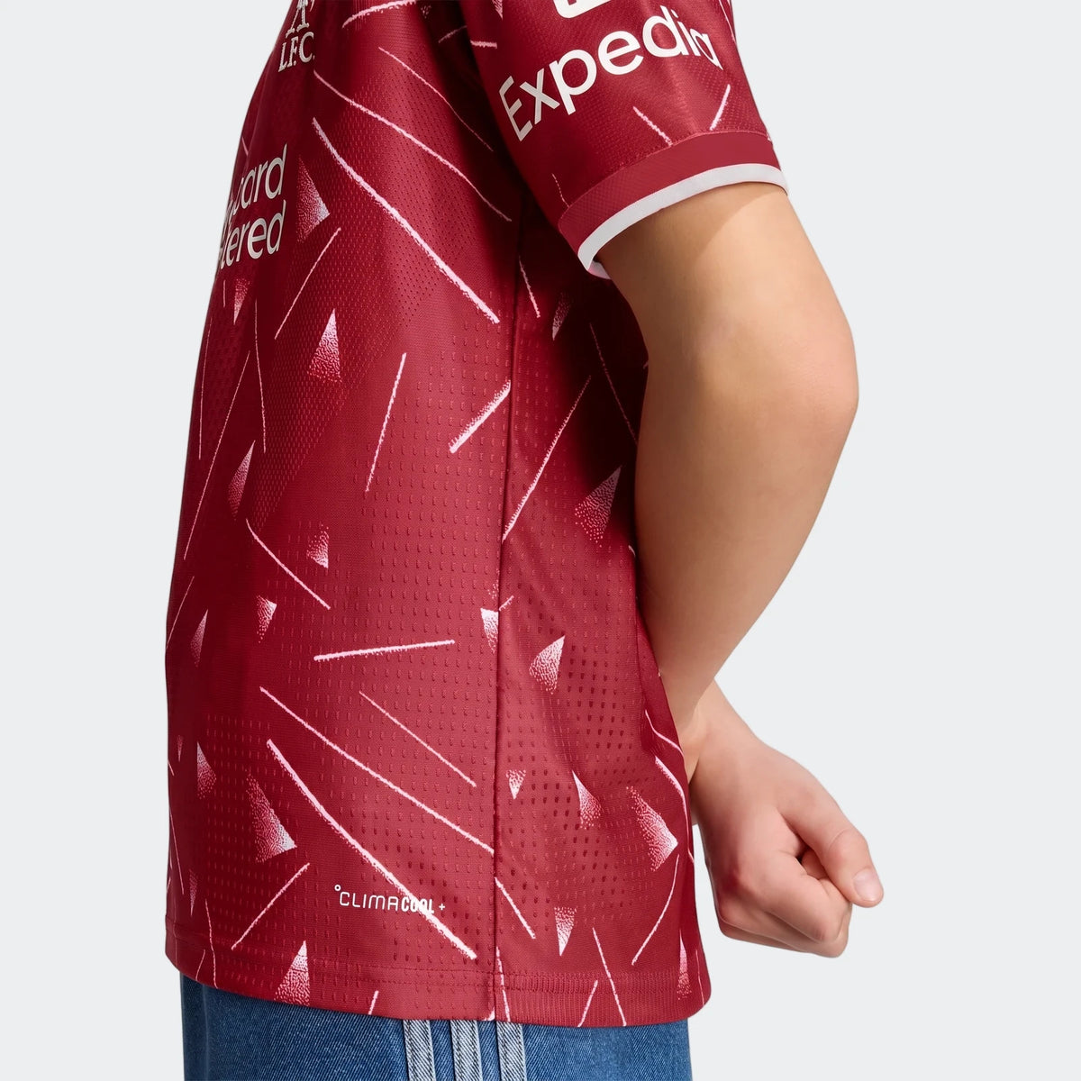 Liverpool FC 26 27 Authentic Home Jersey Youth in red, side view showing white geometric pattern and short sleeve cuff