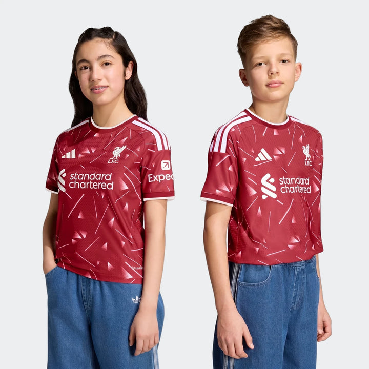 Liverpool FC 26/27 Authentic Home Jersey Youth in red with white shoulder stripes, short-sleeve front view.