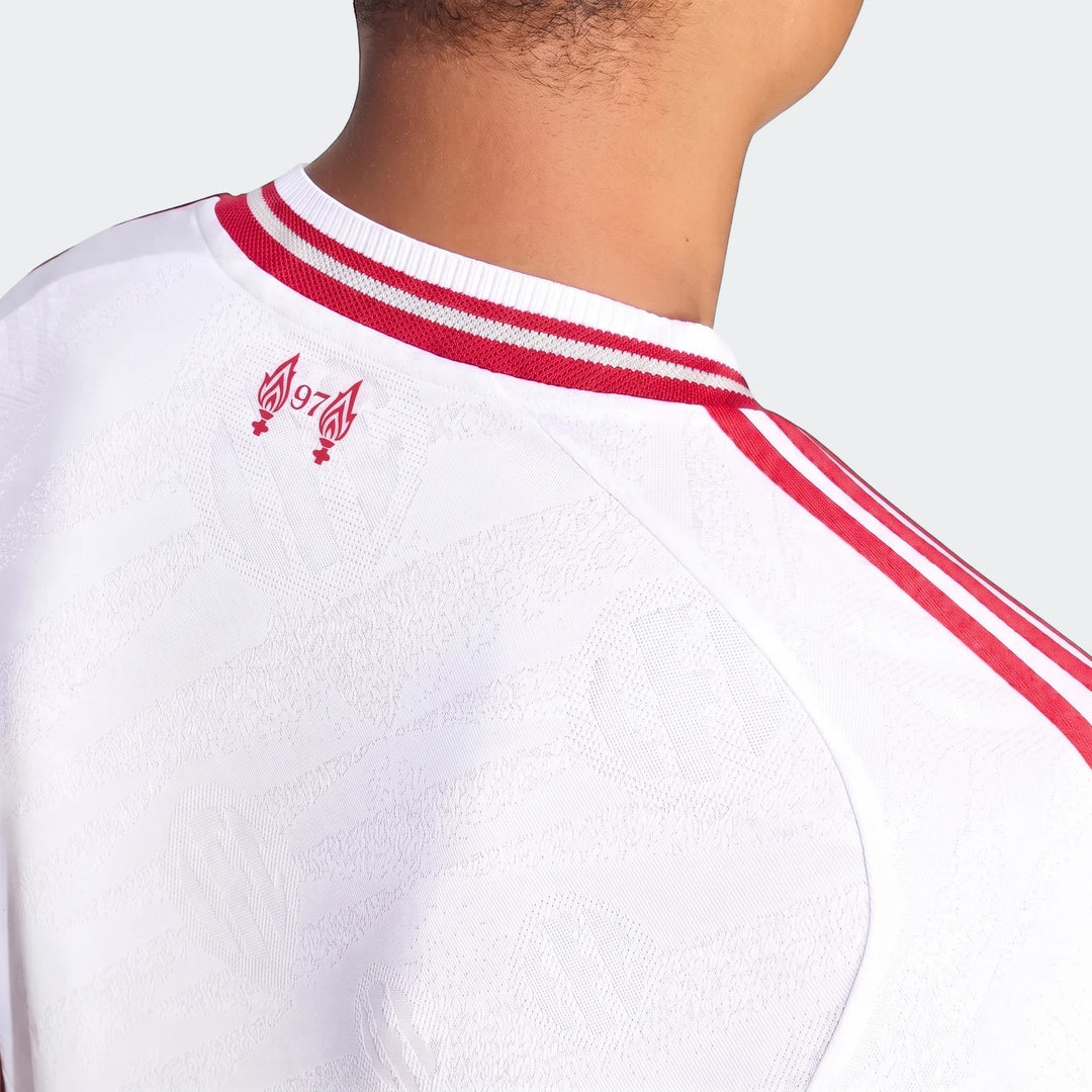 Close-up of the back of a person wearing a white Liverpool Fc 26/27 Away Authentic jersey with red '97' graphic and red