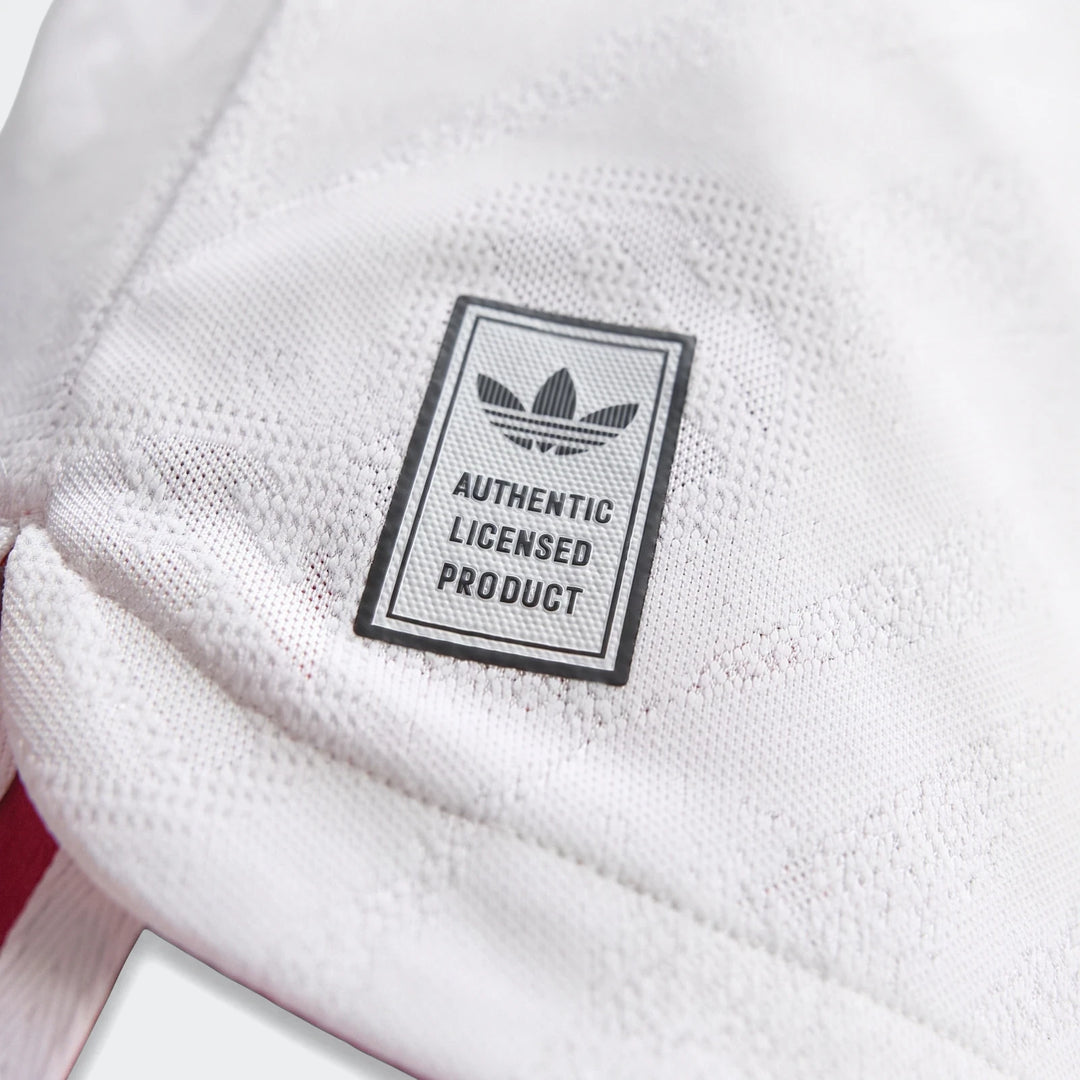 Close-up of the white Liverpool Fc 26/27 Away Authentic Jersey Longsleeve, showing its knit texture and Adidas authentic