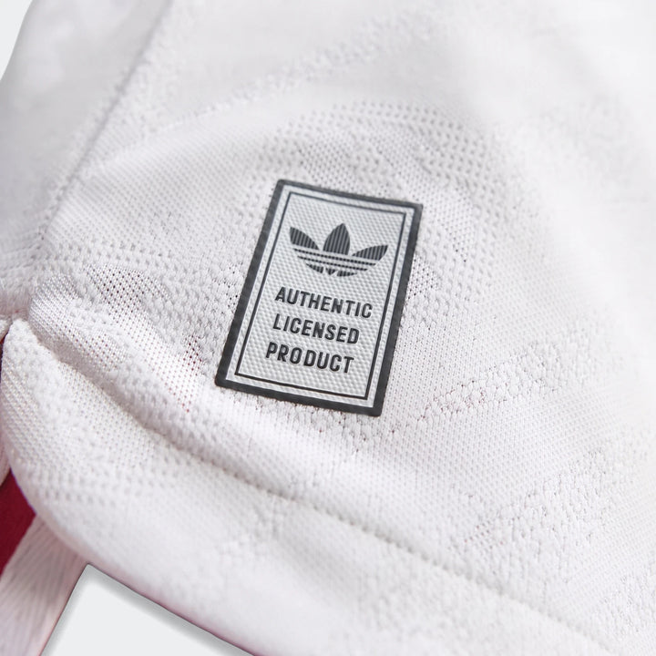Close-up of the white Liverpool Fc 26/27 Away Authentic Jersey Longsleeve, showing its knit texture and Adidas authentic