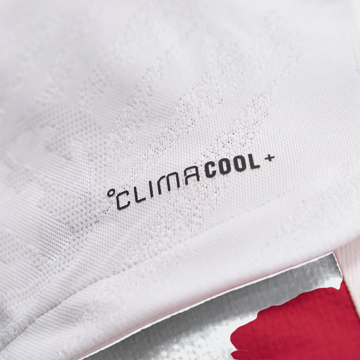 Close-up of a white Liverpool FC 26/27 Away Authentic Longsleeve Jersey, featuring the black 'CLIMACOOL +' logo and textured