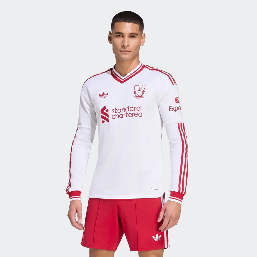 Men's Liverpool FC 26/27 Away Authentic long-sleeve jersey in white with red stripes, worn by a model.