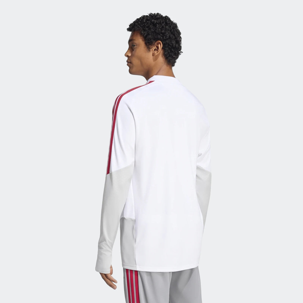 Men's white long-sleeve Liverpool Fc 26/27 Cup Tiro Training Top, shown from a three-quarter back view.